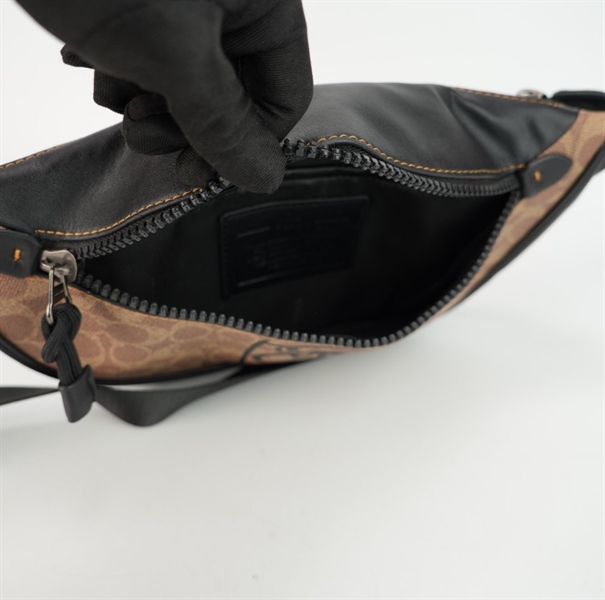 Túi bao tử Coach nâu ++