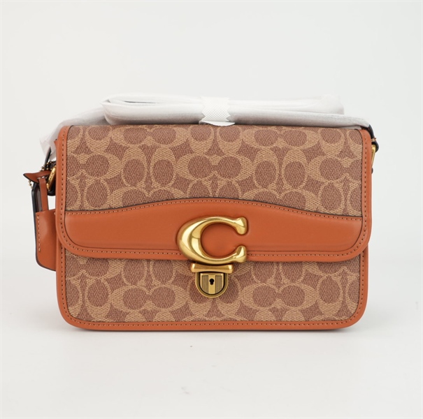 Túi Coach nâu khóa vàng 22cm+