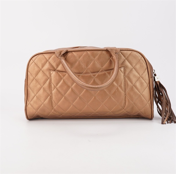 Túi Chanel màu vàng có tua rua s35 KG++