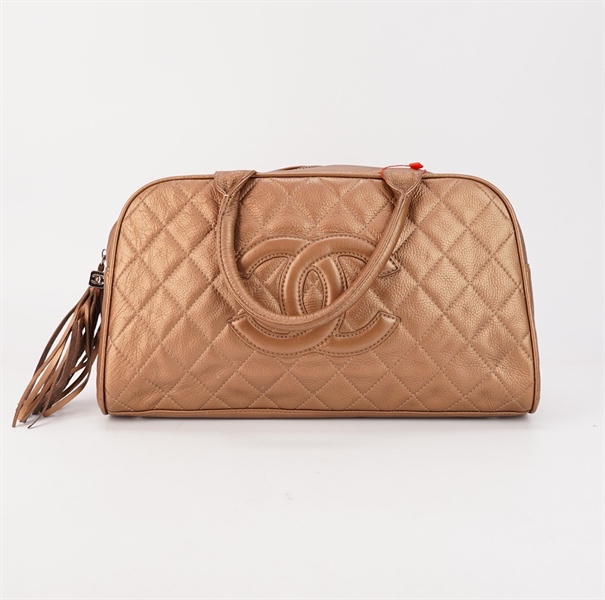 Túi Chanel màu vàng có tua rua s35 KG++