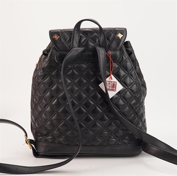 Balo MCM màu đen đinh charm KG+