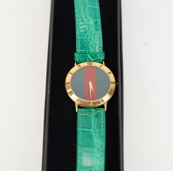 Đồng hồ GG mặt tròn dây xanh lá KG+