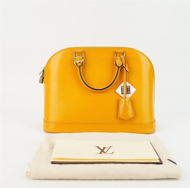 Túi LV alma màu vàng có ổ khóa +