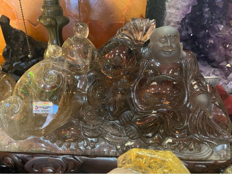 Tác phẩm di lặc to tóc vàng+