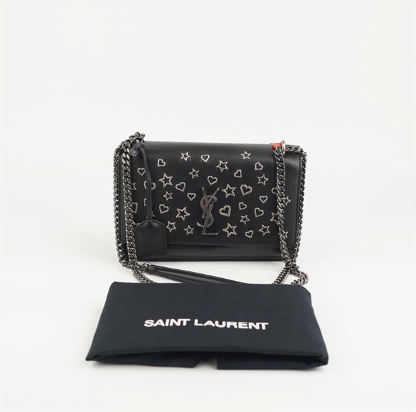 Túi YSL đen đính charm ngôi sao size 22 (TB)+