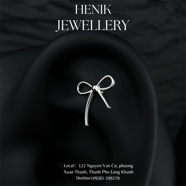 BOW SHAPED EARRING 1 - TITANIUM