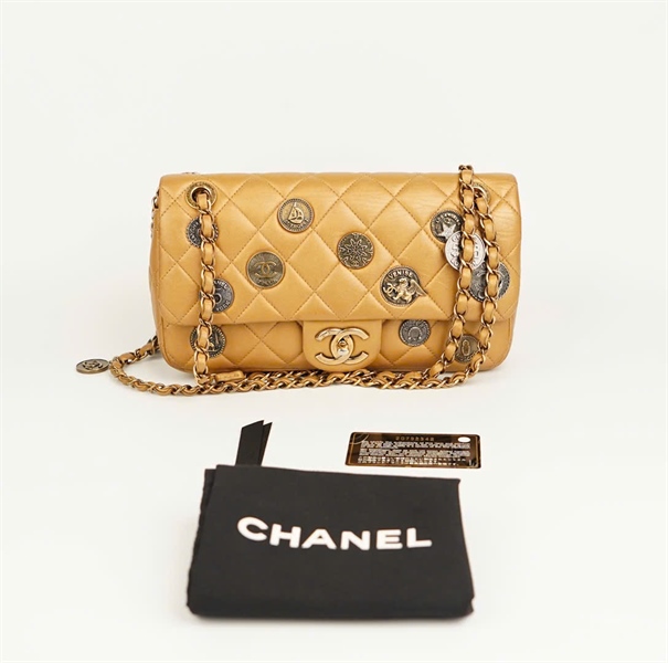 Túi Chanel charm đồng xu màu vàng đồng (HC) +