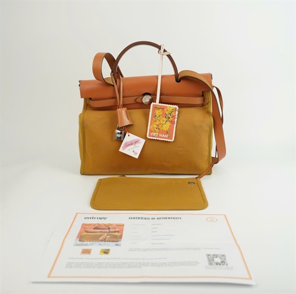 Túi Hermes vải vàng kèm pound, charm + ố và chìa có lót form đen KG+