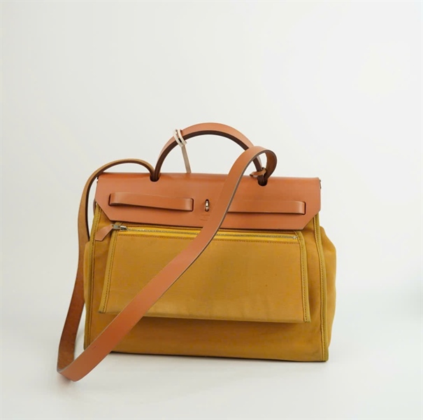 Túi Hermes vải vàng kèm pound, charm + ố và chìa có lót form đen KG+