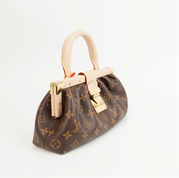 Túi LV Clutch hoa nâu sz30 (HC) +