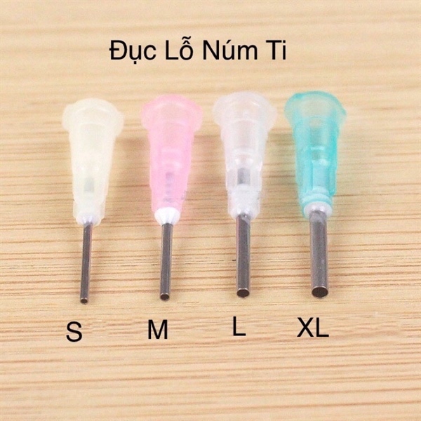 Dụng cụ dùng để dập đục lỗ núm ty bình sữa