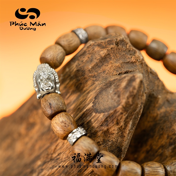 Vòng Trầm Tốc Kiến Malay Phối Charm Đầu Phật Bạc 925 Mạ Vàng 14K Đính Đá CZ