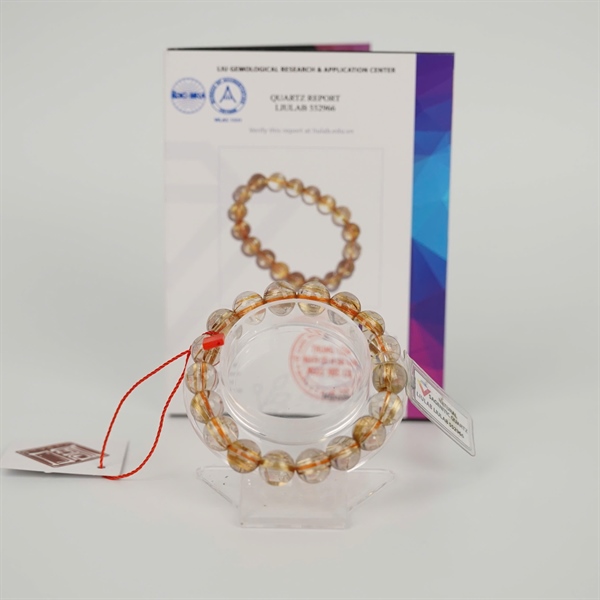 Vòng tay thạch anh tóc vàng 552966 KG+