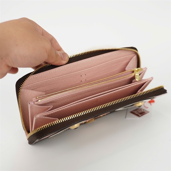 Ví LV hoa nâu khóa zip mắt trắng đen TS4197 +