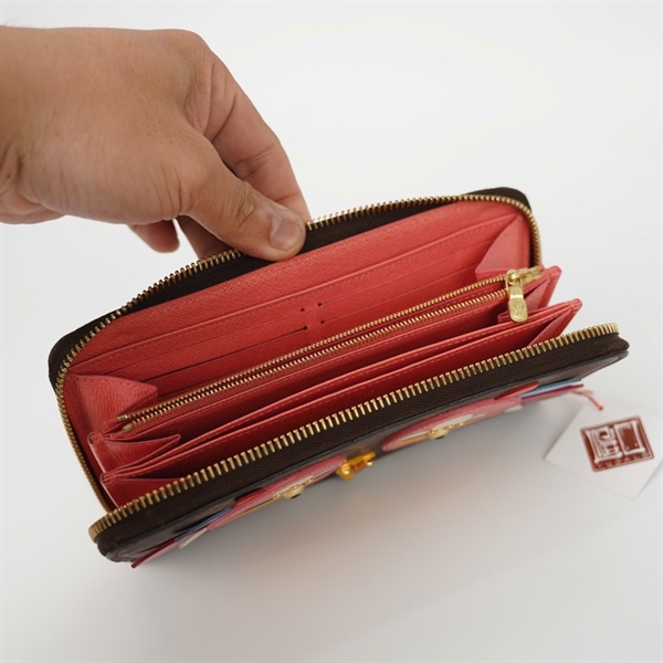 Ví LV hoa nâu khóa zip mắt hồng CA0197+