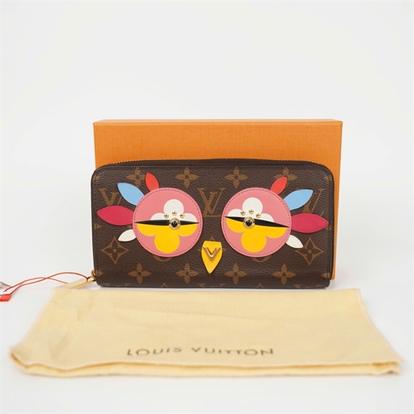 Ví LV hoa nâu khóa zip mắt hồng CA0197+