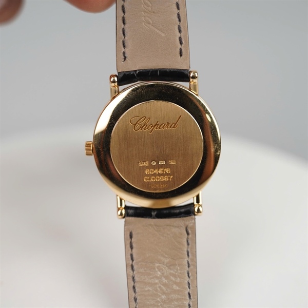 Đồng hồ Chopard mặt tròn dây đen (604676) sz34 (HC) +