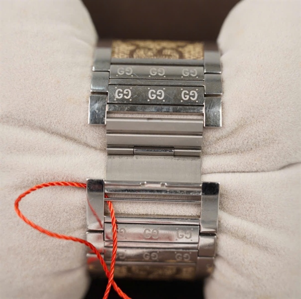 Đồng hồ GG mặt tròn dây nâu KG +