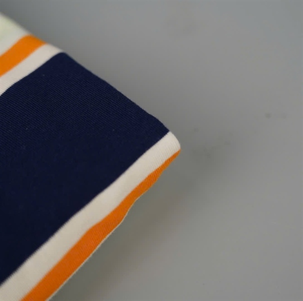 Áo thun GG xanh sọc cam KG+