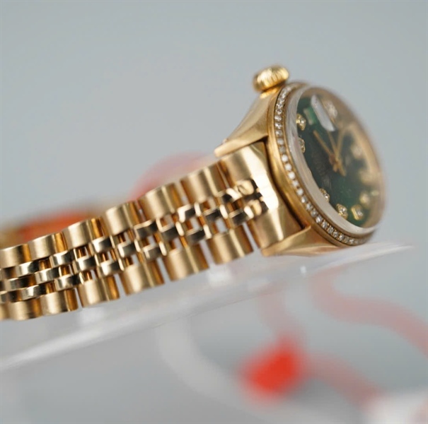 Đồng hồ Rolex vàng mặt xanh lá (HC) KG+