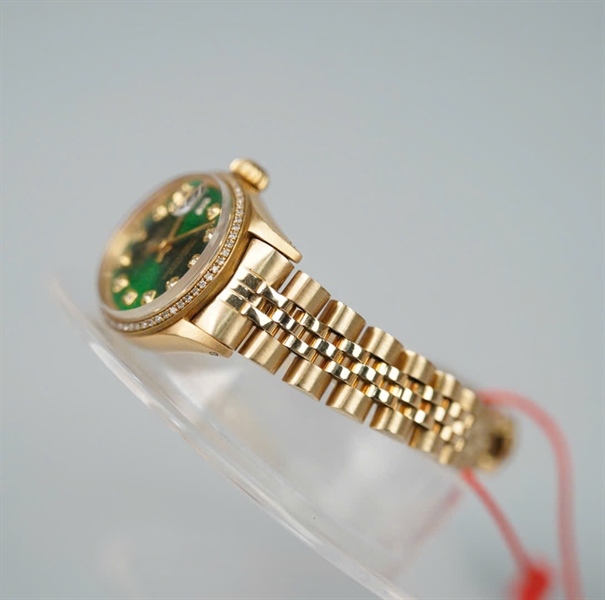 Đồng hồ Rolex vàng mặt xanh lá (HC) KG+