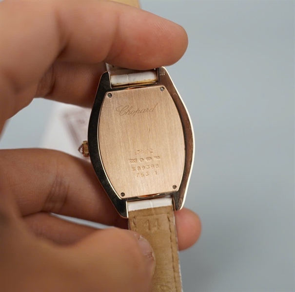 Đồng hồ Chopard dây trắng mặt viền vàng đính đá (7531) (HC)+