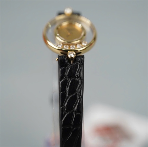 Đồng hồ Chopard dây đen mặt tròn viền vàng (4100) (HC) KG+