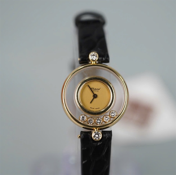 Đồng hồ Chopard dây đen mặt tròn viền vàng (4100) (HC) KG+