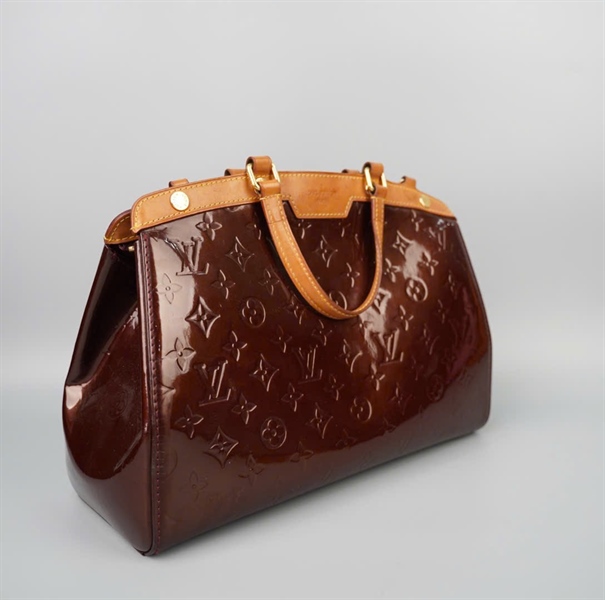 Túi LV handle màu nâu nhũ viền da sz34 KG+