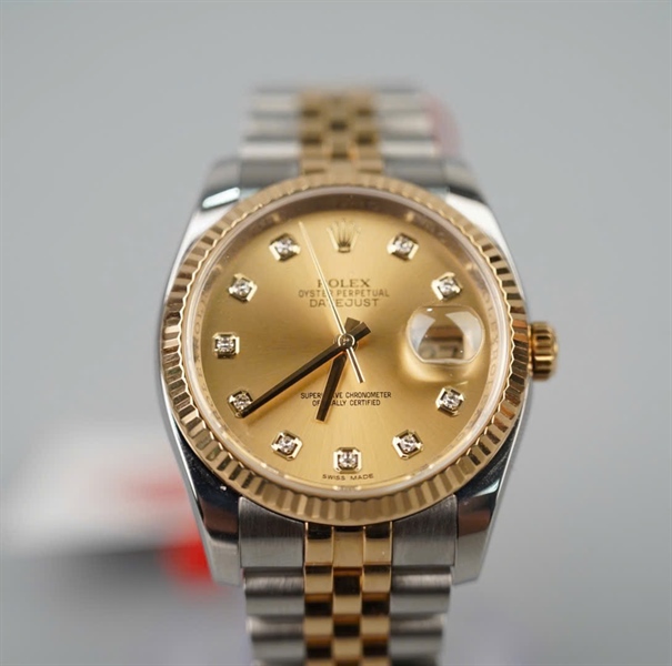 Đồng hồ Rolex mặt tròn viền vàng quai bạc (Q5602411) (HC) KG+