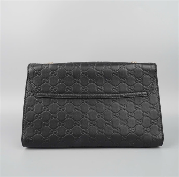 Túi GG đen khóa tua rua (295402001992) sz30 KG+