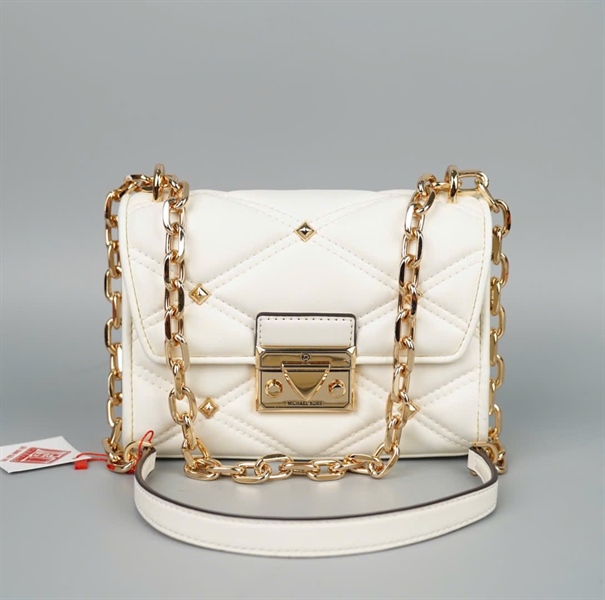 Túi Michael Kor màu trắng hạt vàng +