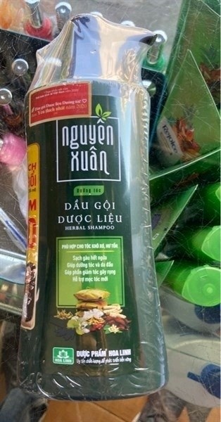 Dầu gội Nguyên Xuân xanh