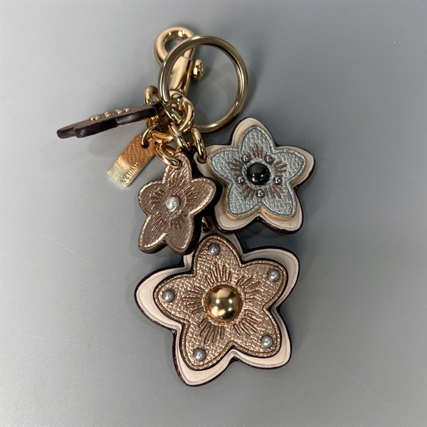 Charm Coach hoa vàng KG+