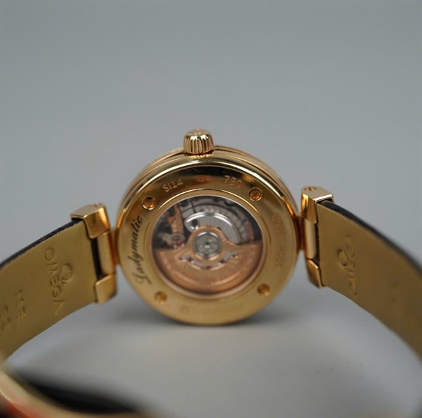 Đồng hồ Omega mặt tròn đen viền vàng (98000117) (HC) KG+