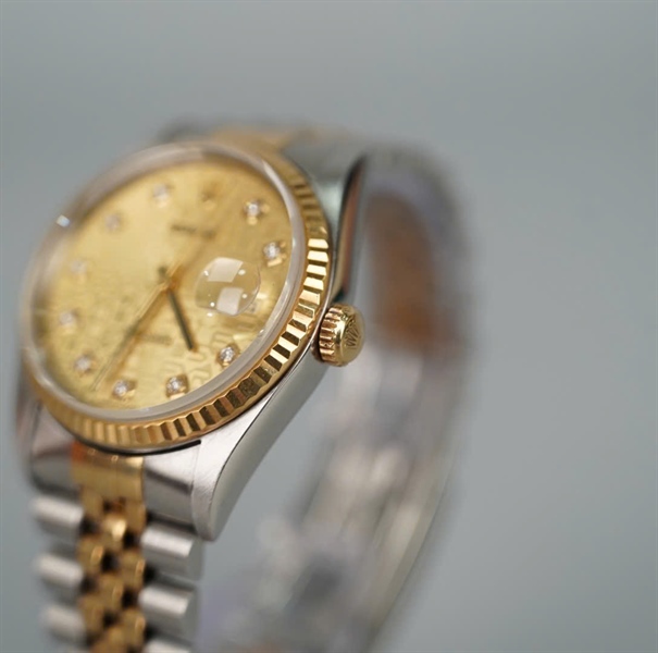 Đồng hồ Rolex mặt tròn viền vàng dây bạc sz36 (HC) KG+