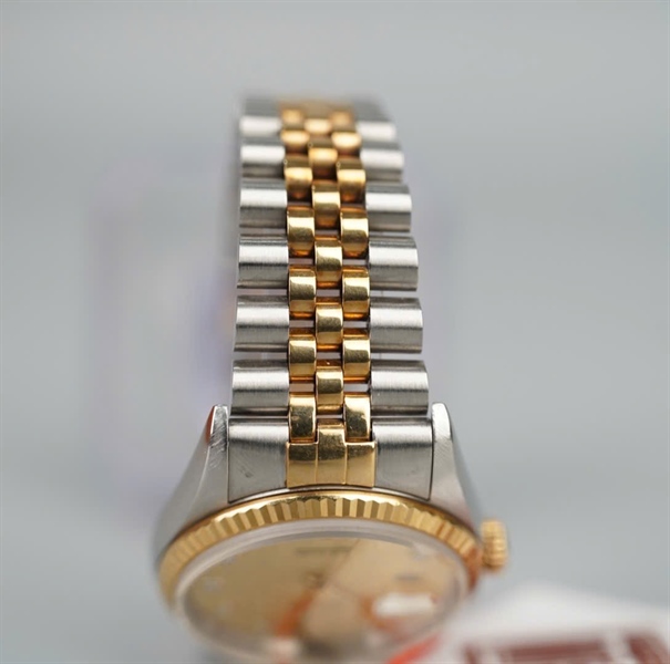 Đồng hồ Rolex mặt tròn viền vàng dây bạc sz36 (HC) KG+