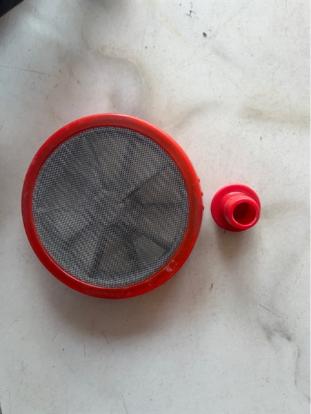 Lược rác đỏ có đầu