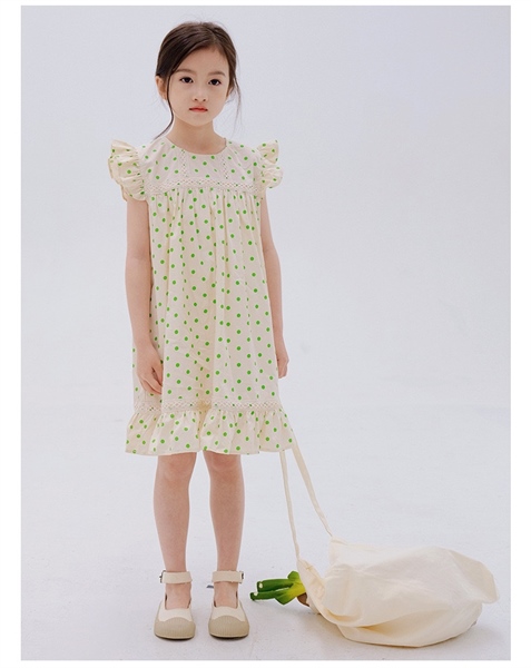 Váy màu kem chấm bi xanh