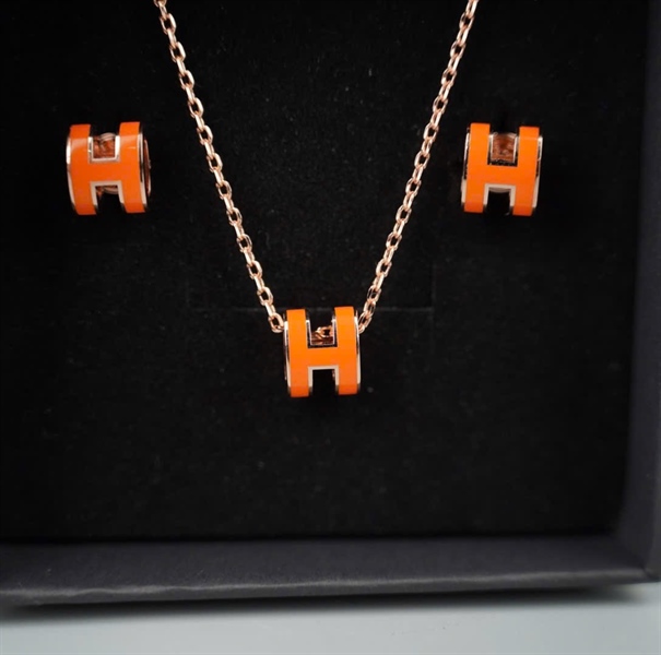 Set nữ trang Hermes bông tai + dây chuyền chữ H cam (A-T) KG+