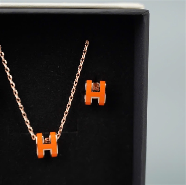 Set nữ trang Hermes bông tai + dây chuyền chữ H cam (A-T) KG+