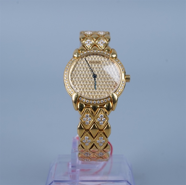 Đồng hồ Chaumet mặt tròn dây vàng KG+