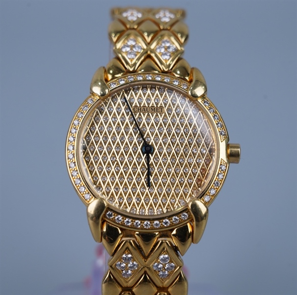 Đồng hồ Chaumet mặt tròn dây vàng KG+