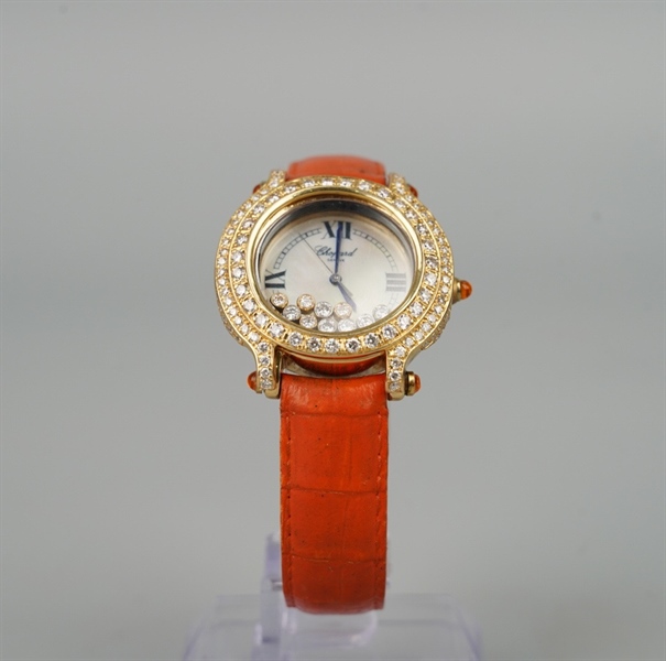 Đồng hồ Chopard mặt tròn dây cam (7225/9999) KG+