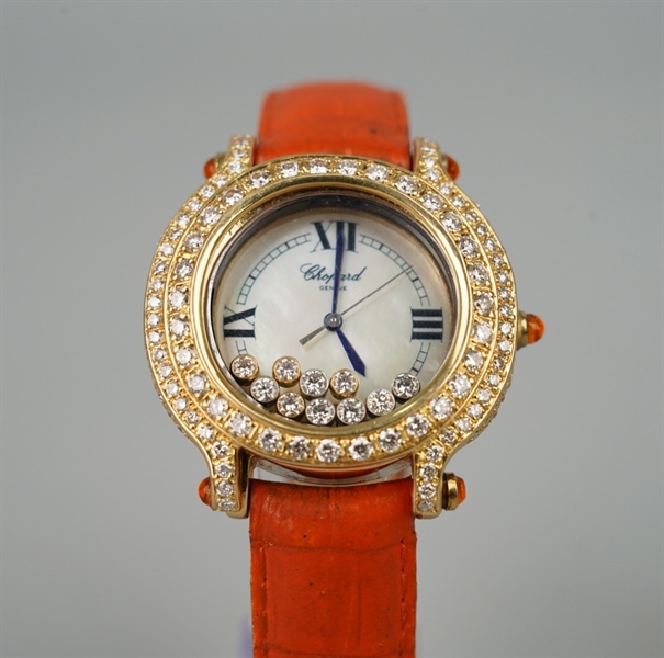 Đồng hồ Chopard mặt tròn dây cam (7225/9999) KG+