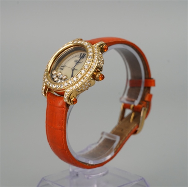 Đồng hồ Chopard mặt tròn dây cam (7225/9999) KG+