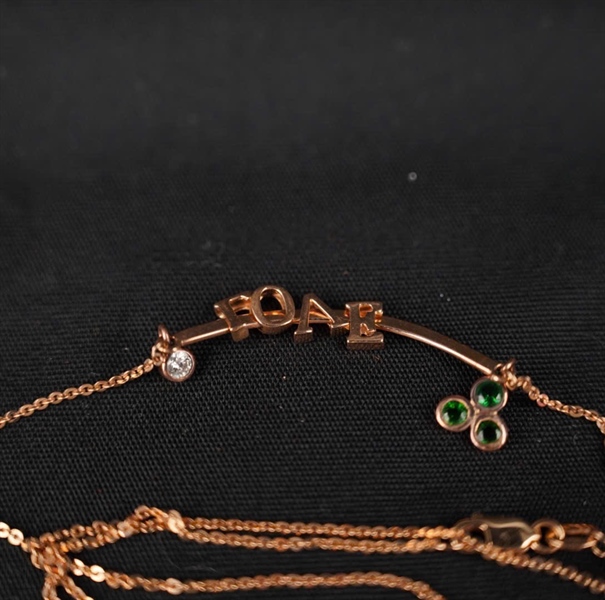 Dây Chuyền Tara 18K chữ Love đính 1v kim cương + gemstone xanh KG+