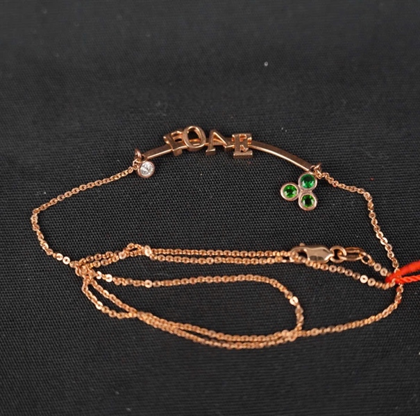 Dây Chuyền Tara 18K chữ Love đính 1v kim cương + gemstone xanh KG+