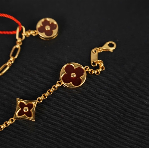 Vòng tay Van Cleef hoa đỏ KG+