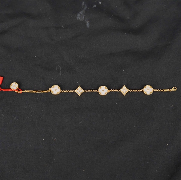 Vòng tay Van Cleef hoa trắng KG+